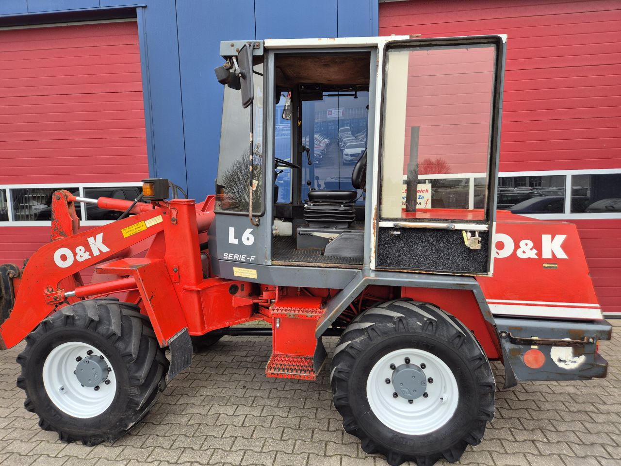 O&K L6 SHOVEL PALLETVORKEN, REDROCK KUILHAPPER EN KENTEKEN