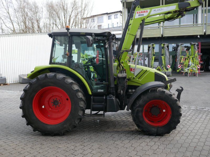 Claas Axos 320 CX