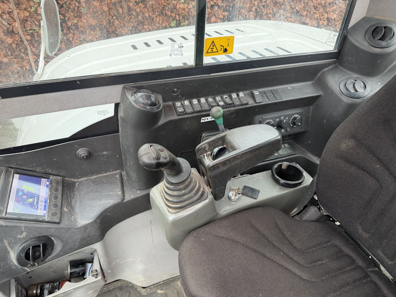 Takeuchi TB290 met diverse bakken