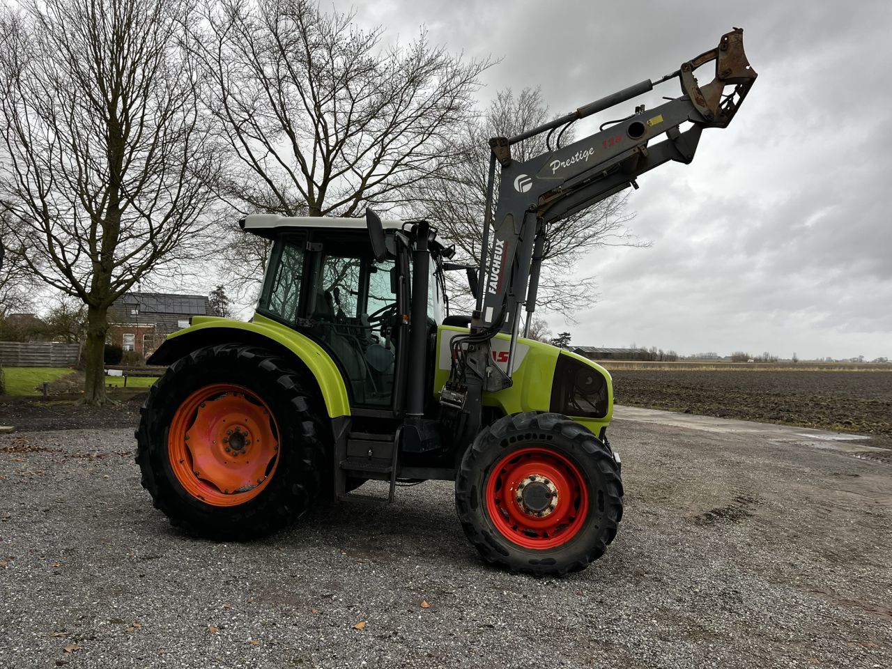 Claas Ares 566 RZ met voorlader