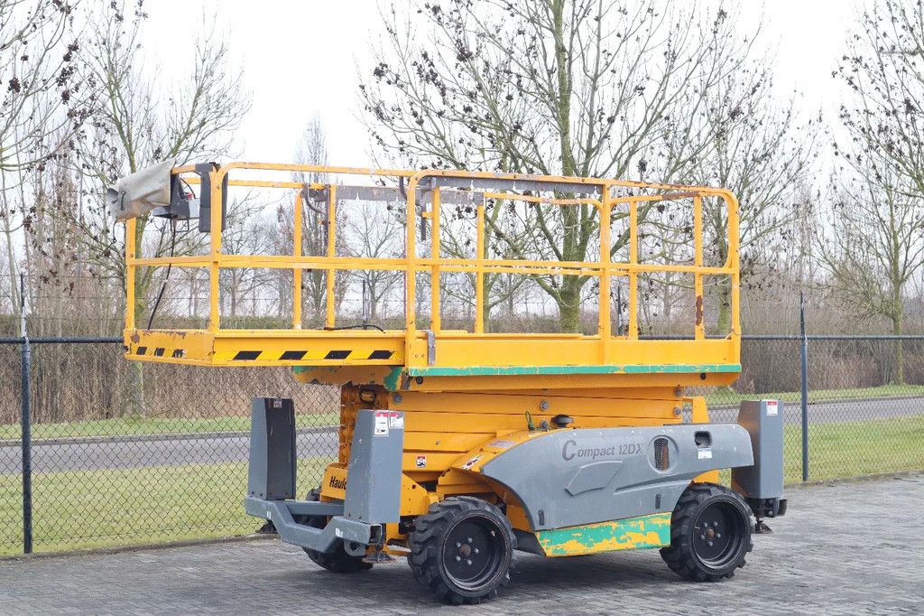 Haulotte COMPACT 12DX | 12 METER | 450 KG | OUTRIGGERS