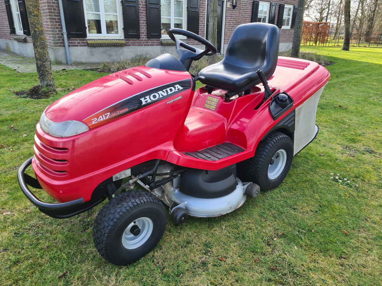 Honda HF 2417 zitmaaier met opvangbak.