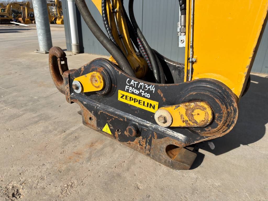 CAT M315F - With OilQuick