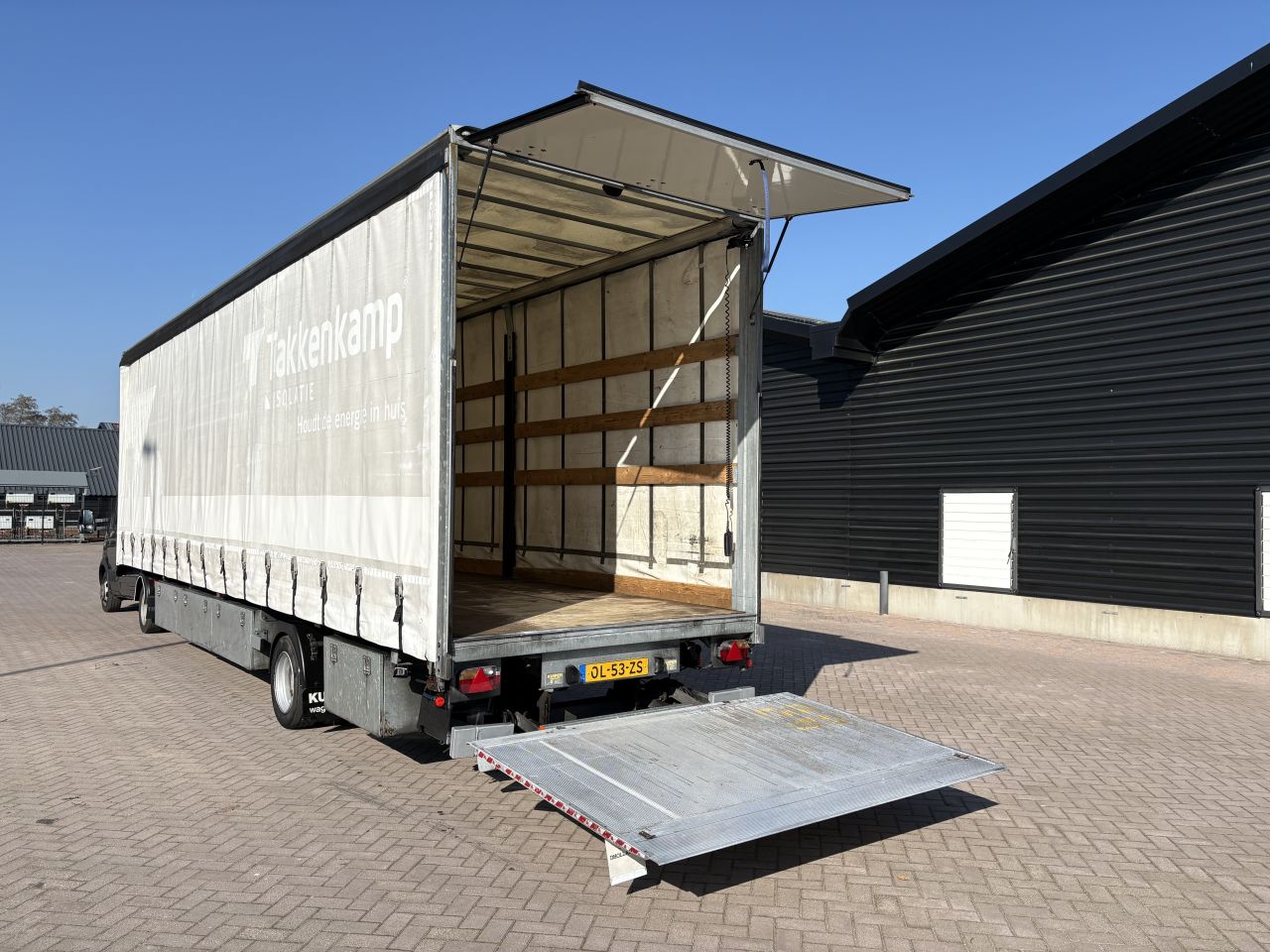 Be oplegger Kuiper gestuurde as schuifzeilen laadklep