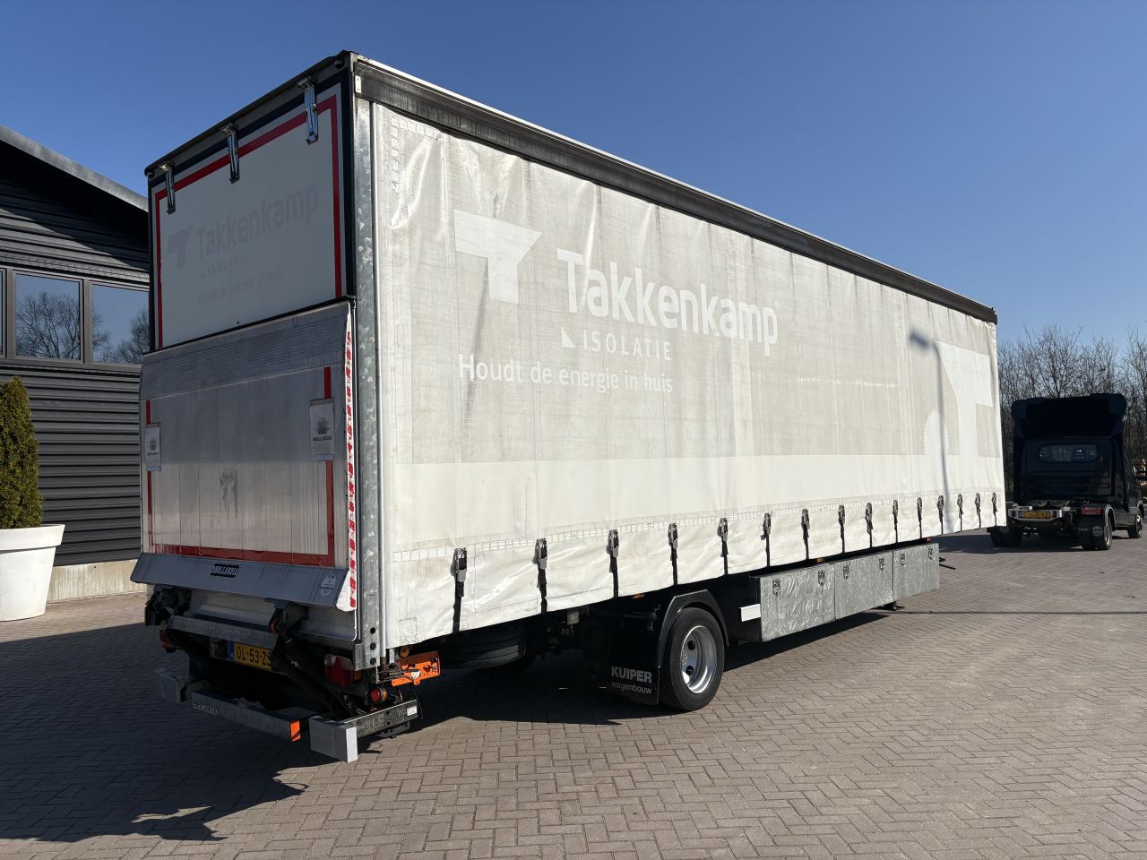 Be oplegger Kuiper gestuurde as schuifzeilen laadklep