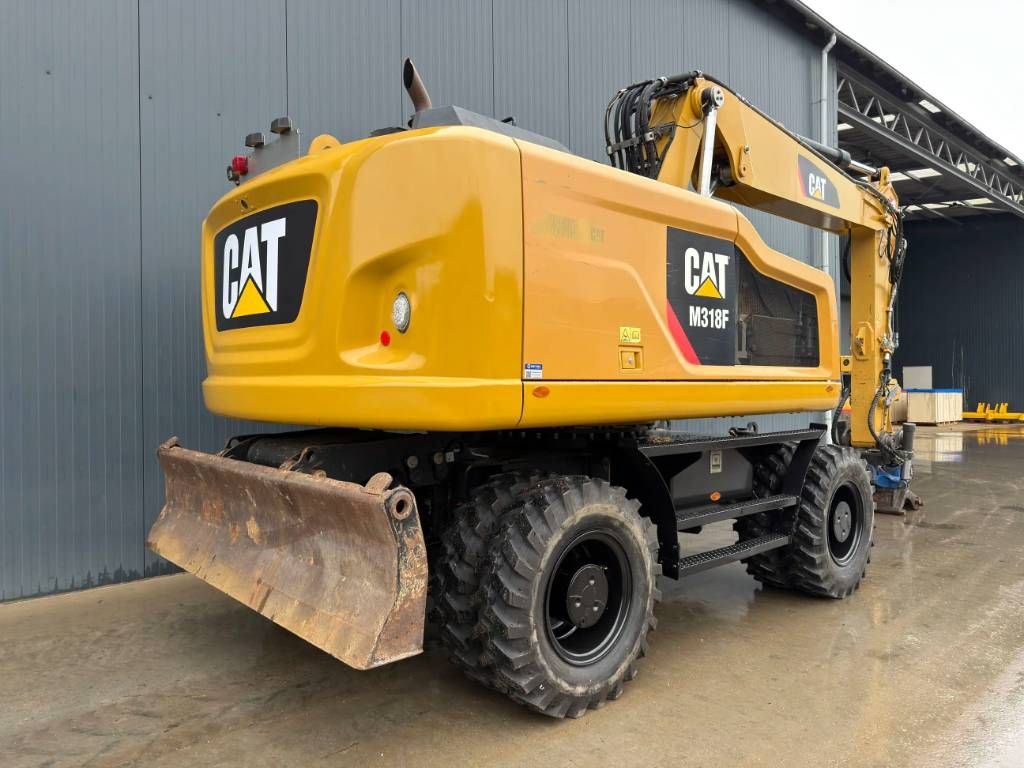 CAT M318F