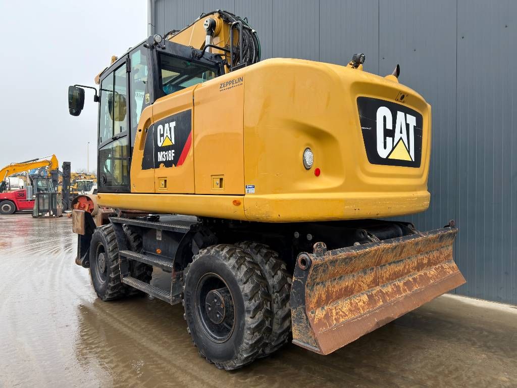 CAT M318F