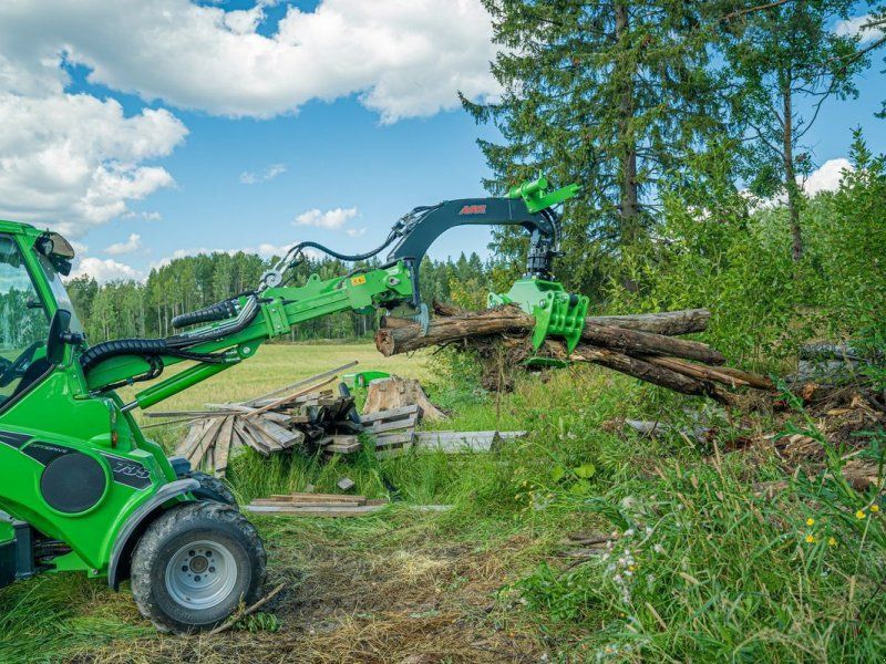 At Holzgreifer HD mit hydraulischem Rotator