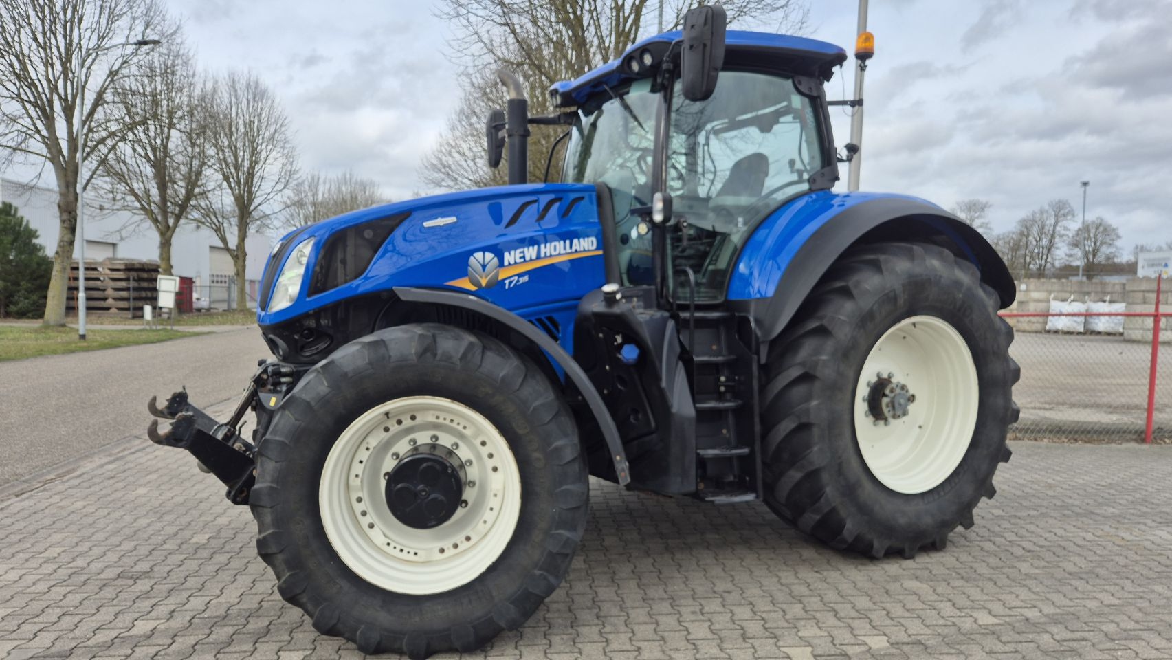 New Holland T7.315 HD AC met Fronthef en Lucht
