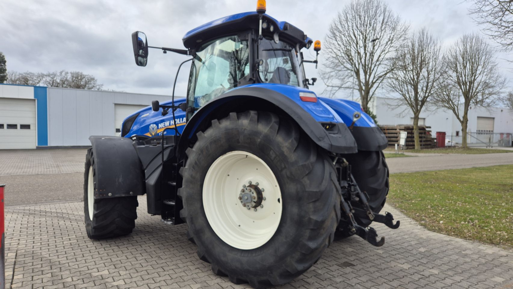 New Holland T7.315 HD AC met Fronthef en Lucht