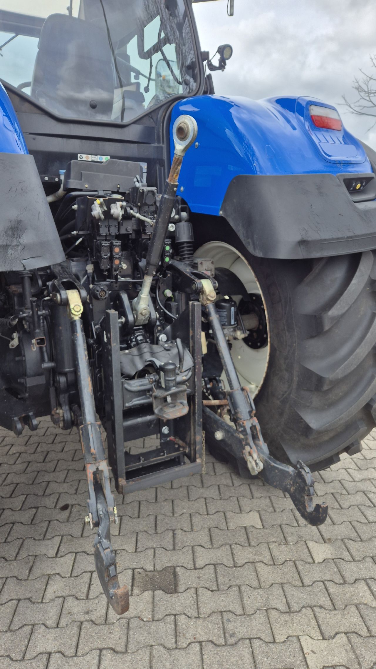 New Holland T7.315 HD AC met Fronthef en Lucht