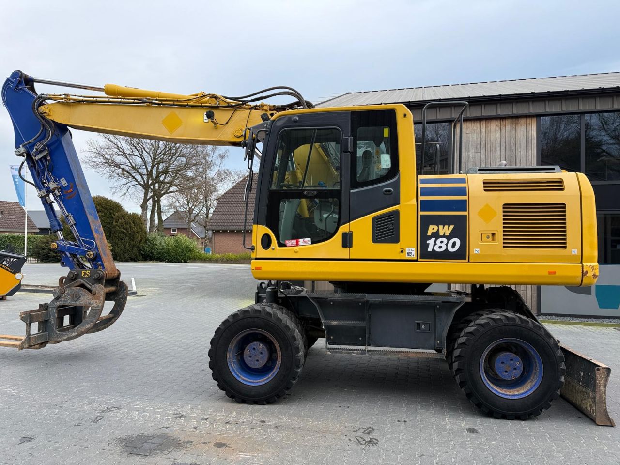 KOMATSU PW18-10 wielkraan met automatische smering