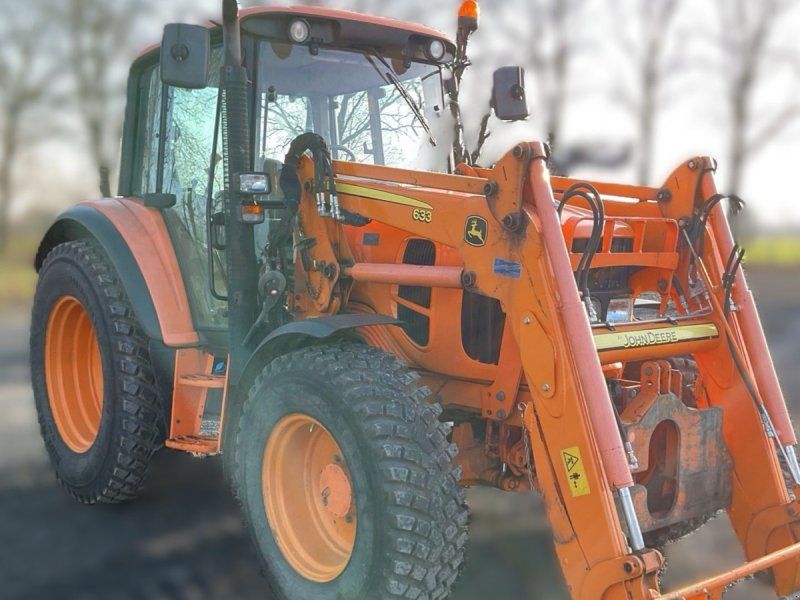 John Deere 6430 Med fuldhydraulisk frontlæsser og vej-transport hjulmonteri