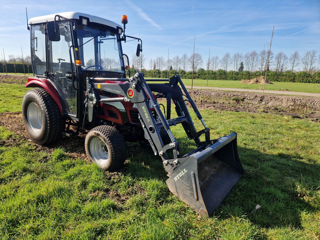 Minitrekker 4x 4 met voorlader trekker knegt 304 CG 2