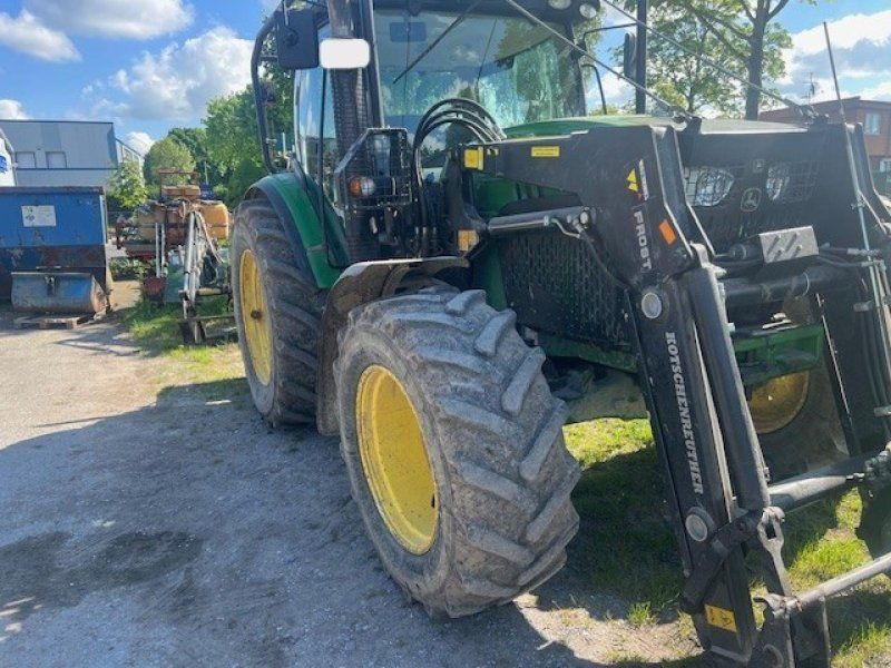 John Deere 6115R Forst
