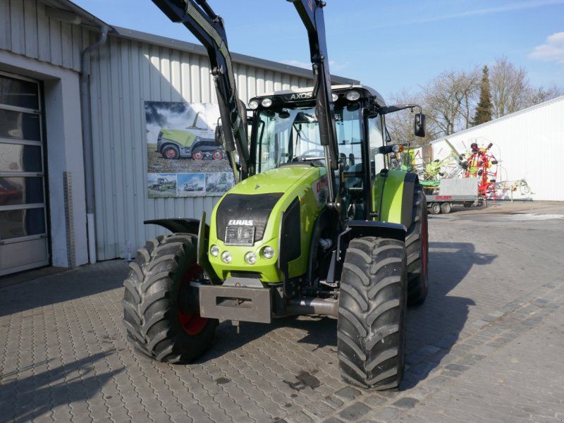 Claas Axos 310 CX