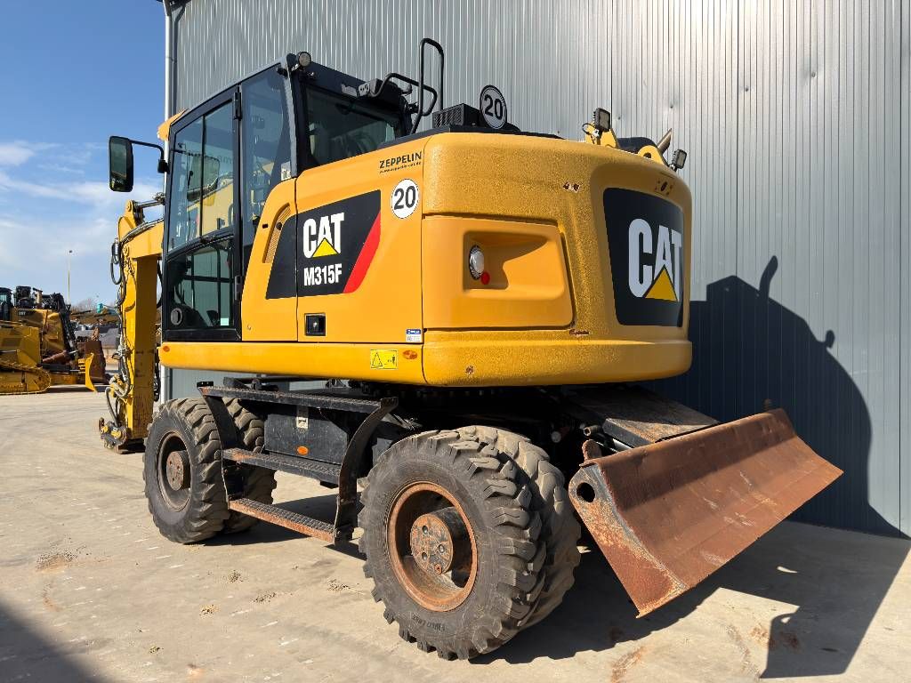 CAT M315F - With OilQuick