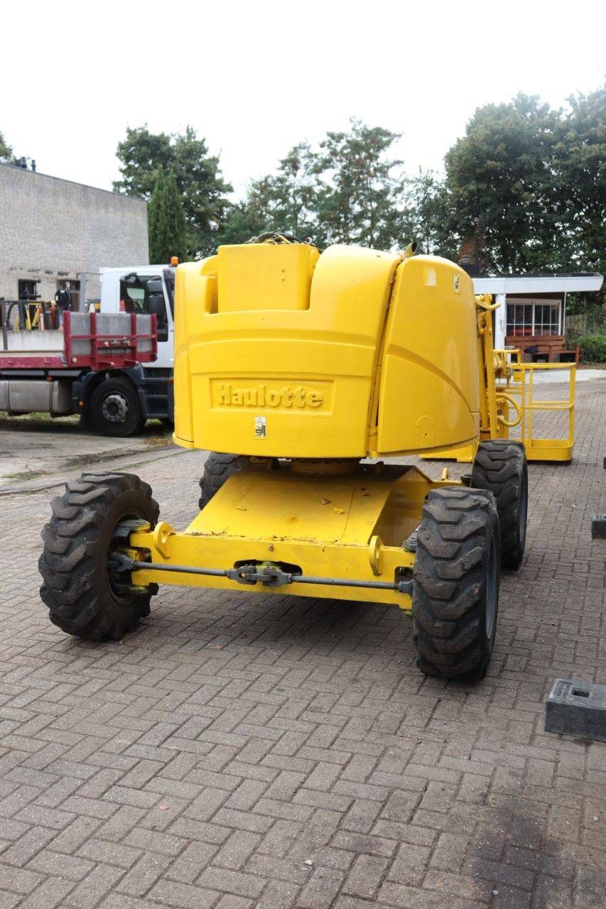 Articulated boom lift Haulotte HA16PX Diesel 16m 2000