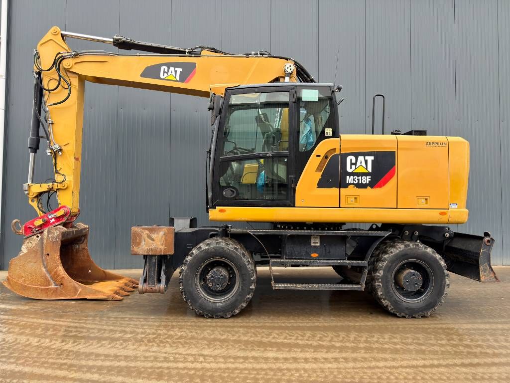 CAT M318F