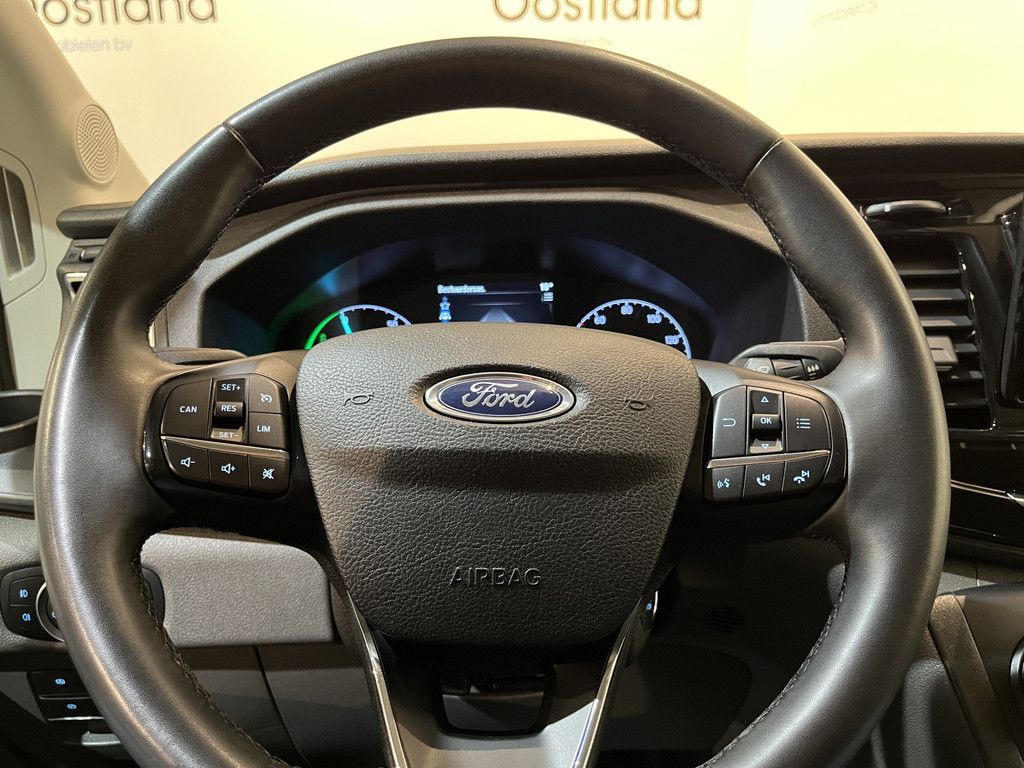 Ford E-Transit 390 (3500 kg) L2H2 Trend 68 kWh 184 PK / 100% Elektrisch !! / Airco / Cruise Control / CarPlay / Camera / Navigatie / 3-Zits / 12.200 KM !!