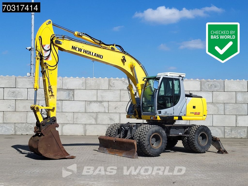 New Holland MH 5.6 Outriggers + Blade