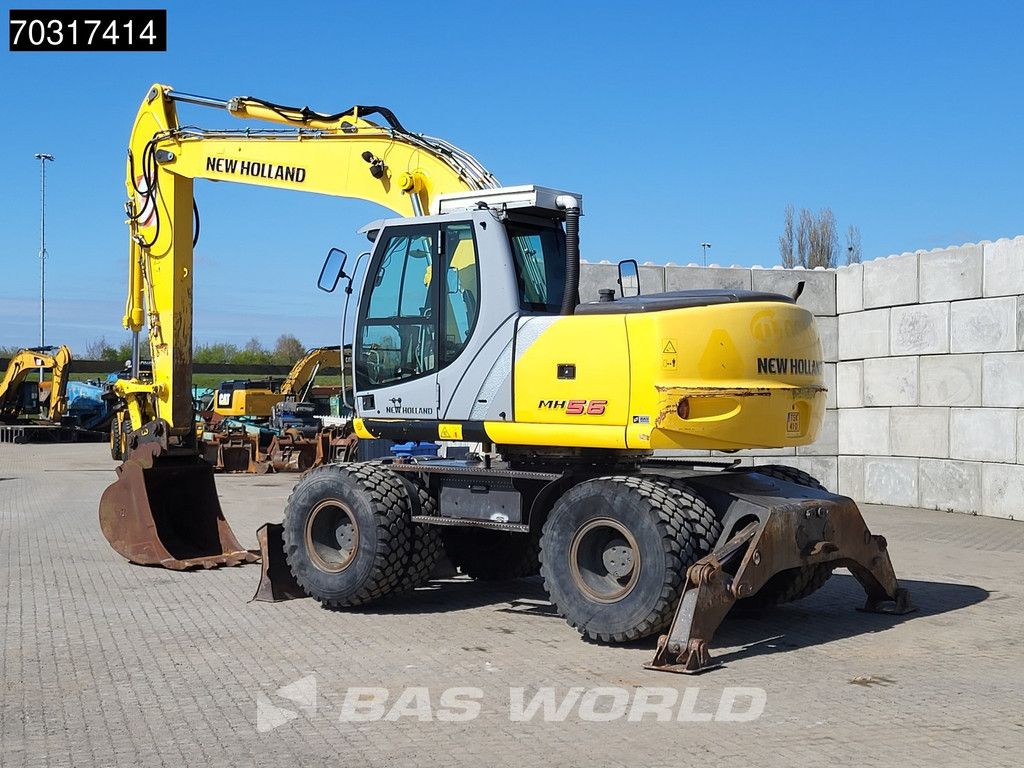 New Holland MH 5.6 Outriggers + Blade