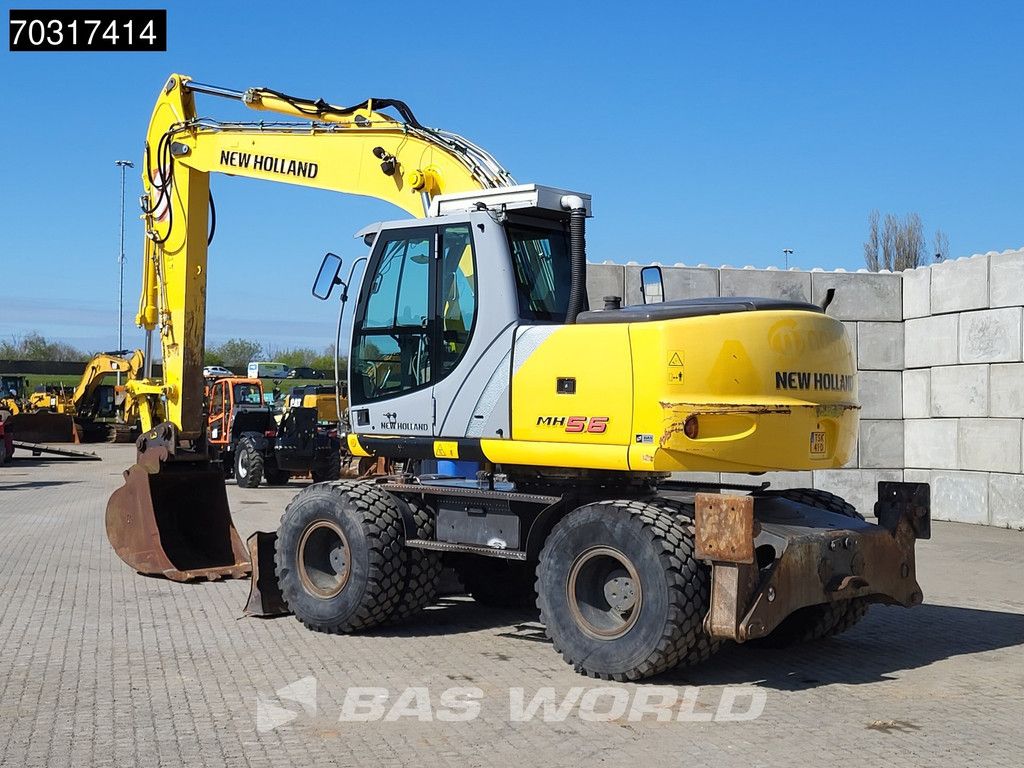 New Holland MH 5.6 Outriggers + Blade