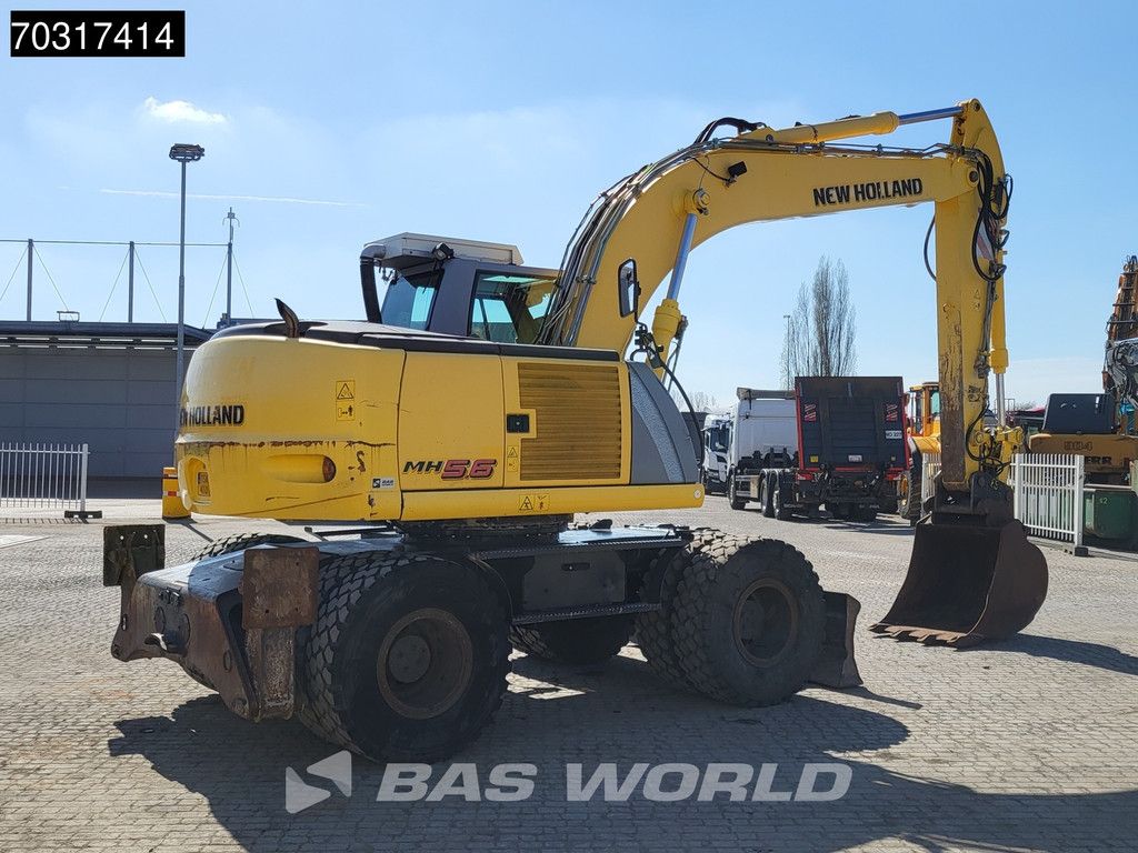 New Holland MH 5.6 Outriggers + Blade