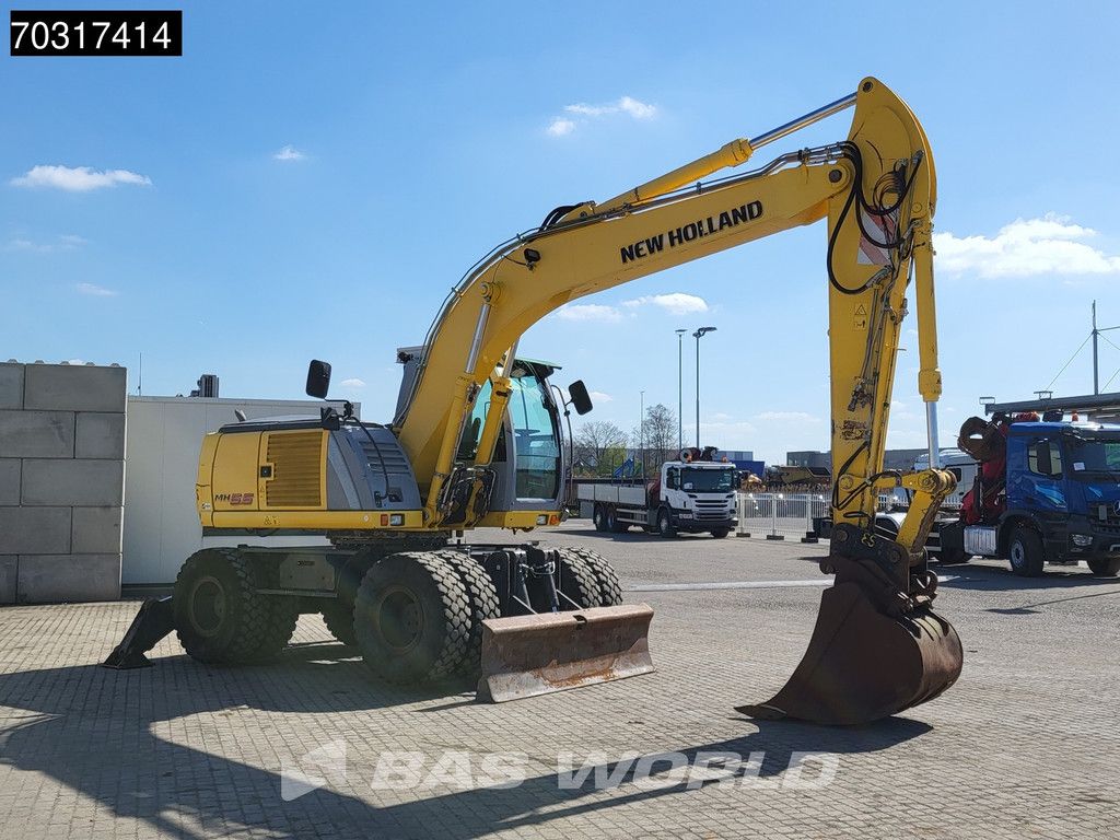 New Holland MH 5.6 Outriggers + Blade