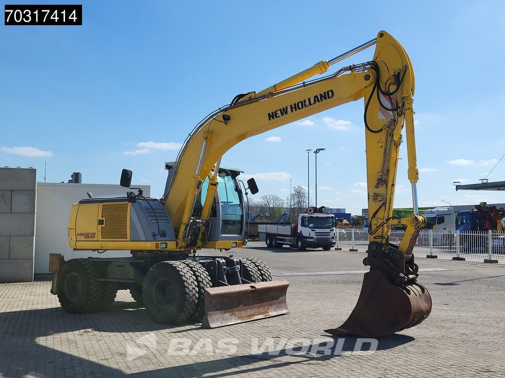 New Holland MH 5.6 Outriggers + Blade