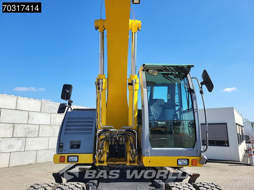 New Holland MH 5.6 Outriggers + Blade