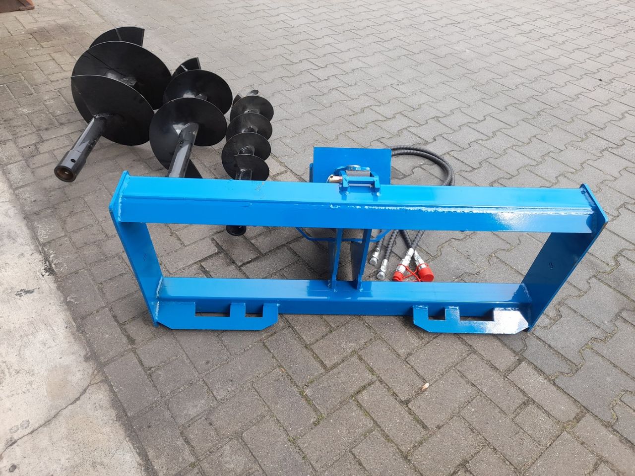 Hydraulische Grondboor Bobcat schranklader CAT Mustang Voorlader