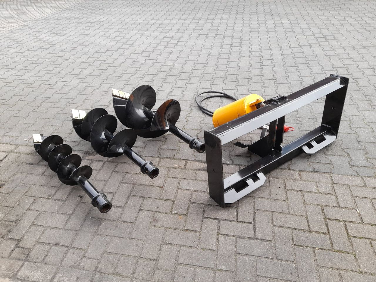 Hydraulische Grondboor Bobcat schranklader CAT Mustang Voorlader