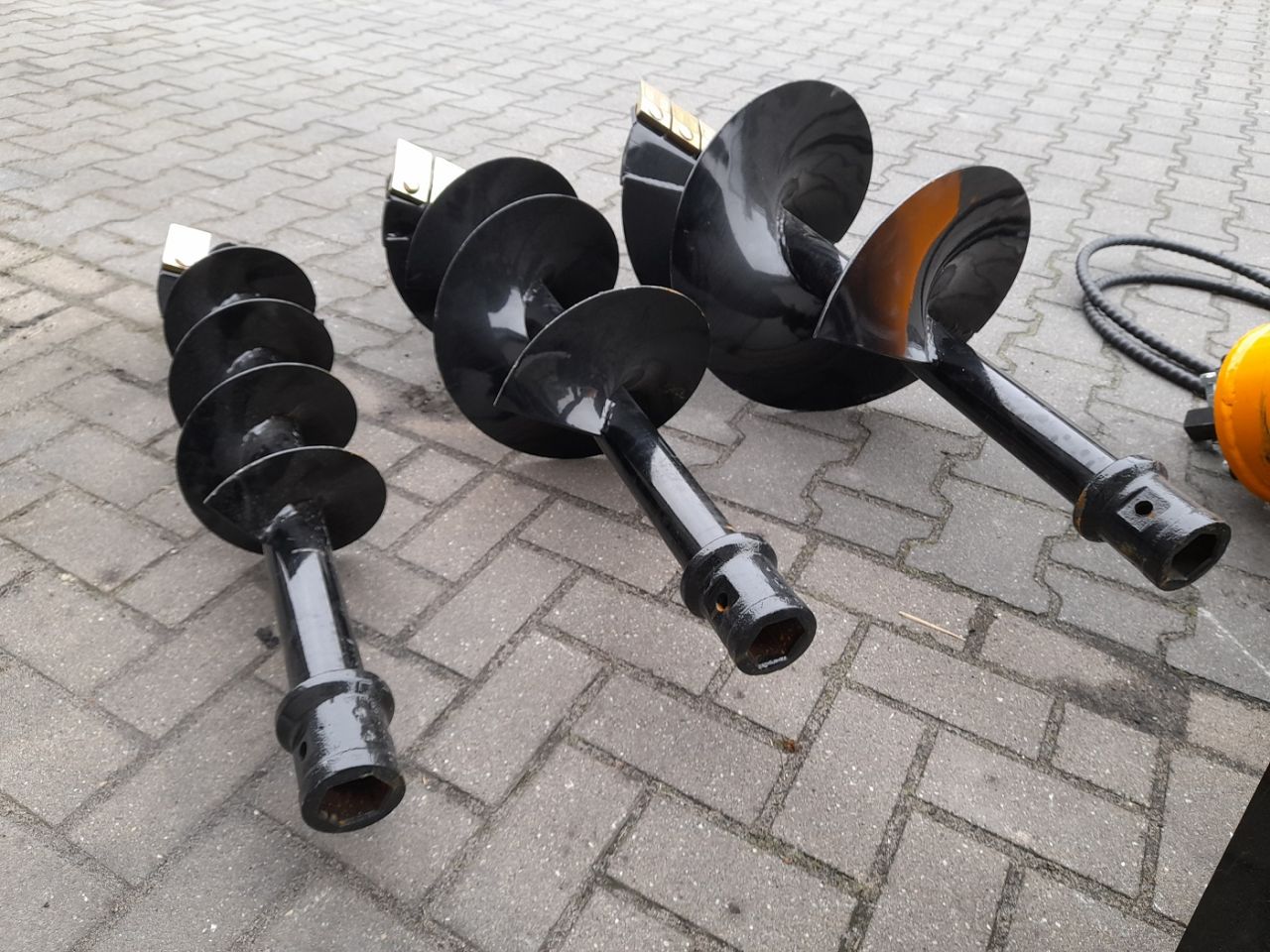 Hydraulische Grondboor Bobcat schranklader CAT Mustang Voorlader