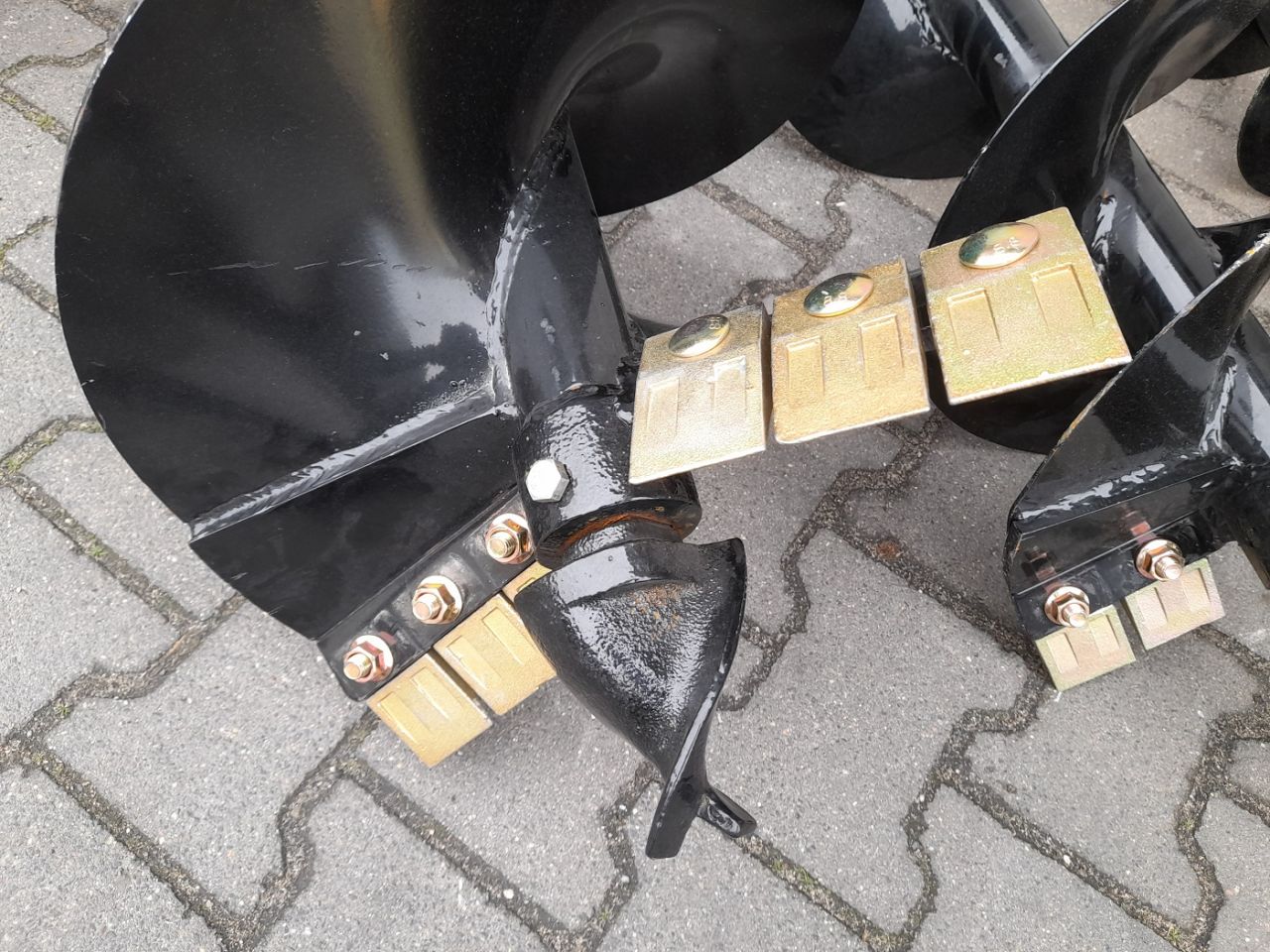 Hydraulische Grondboor Bobcat schranklader CAT Mustang Voorlader