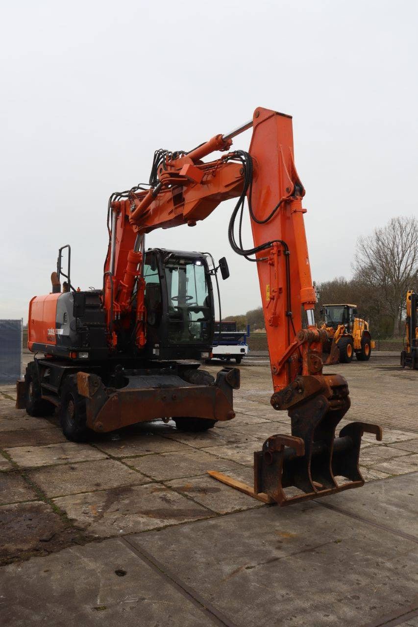 Wheel excavator Hitachi ZX140W-5B Diesel 2016