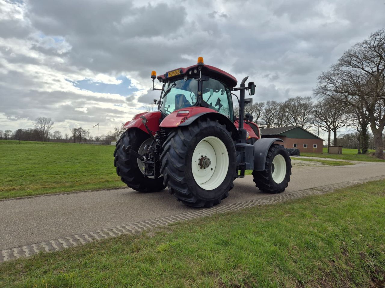 New Holland T 7 210 AC met fronthef / PTO