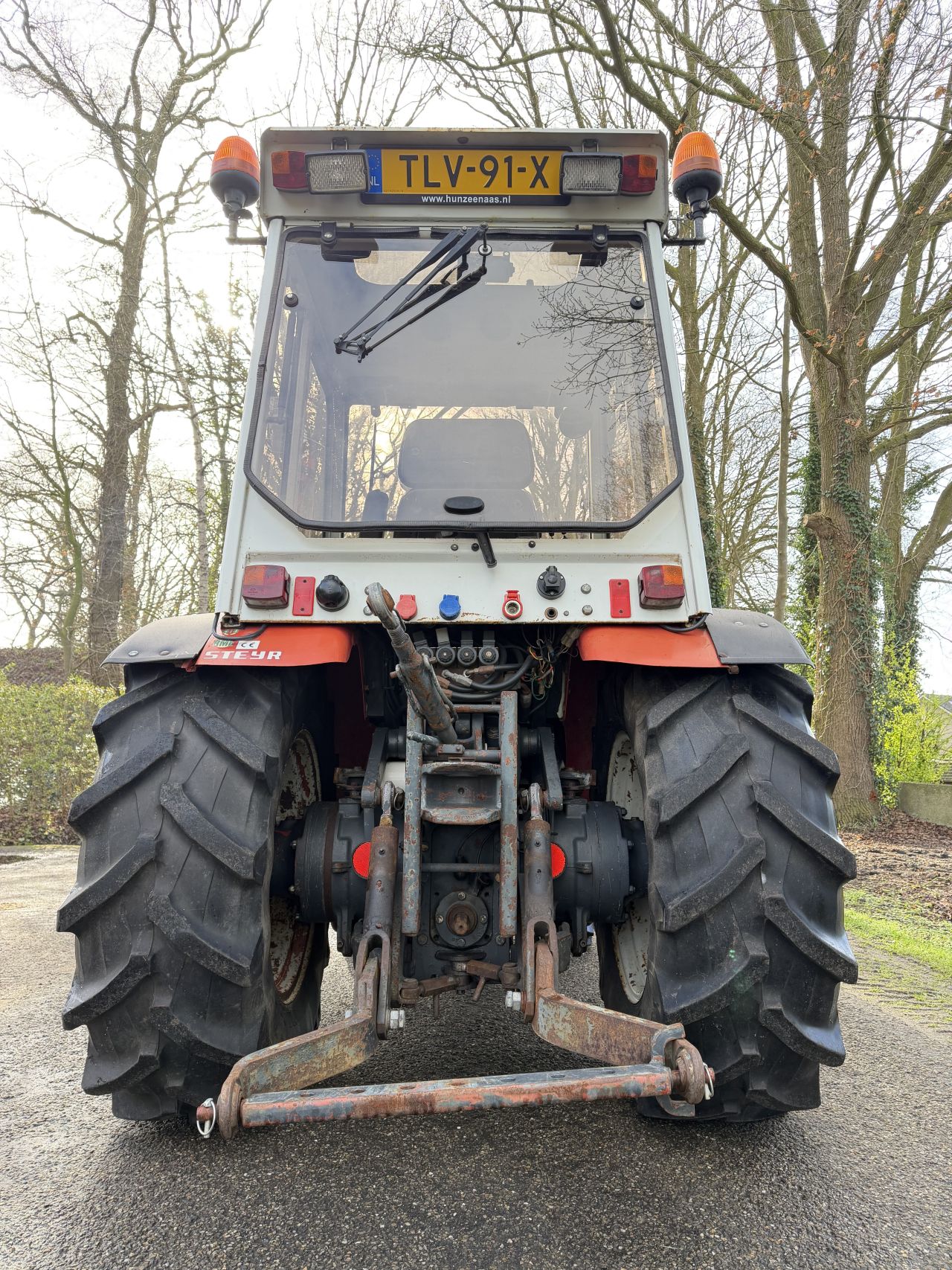 Steyr 8075 Smalspoor met maaiarm