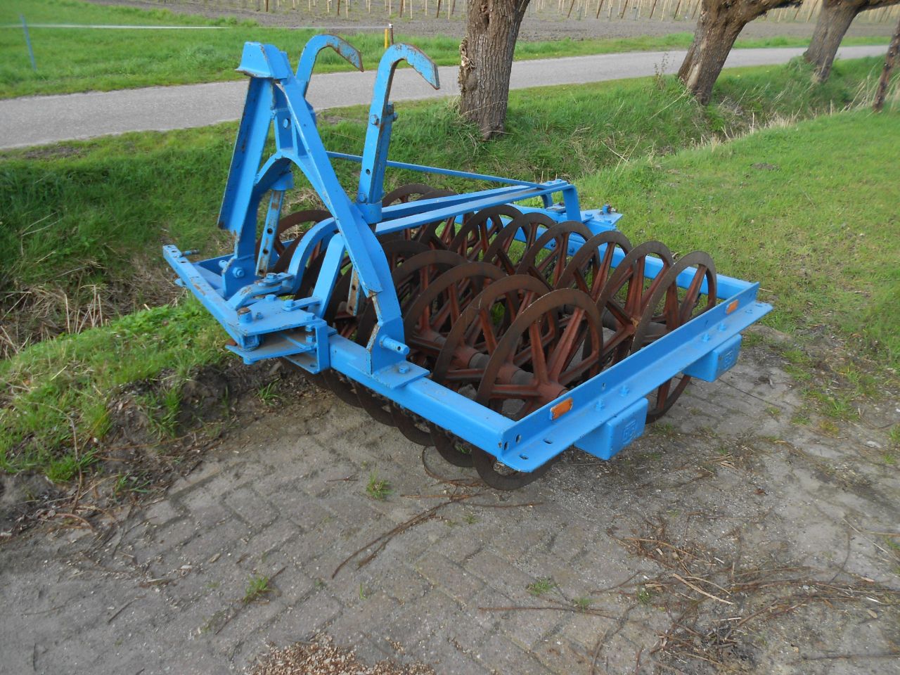 Lemken opal 090 met vorenpakker