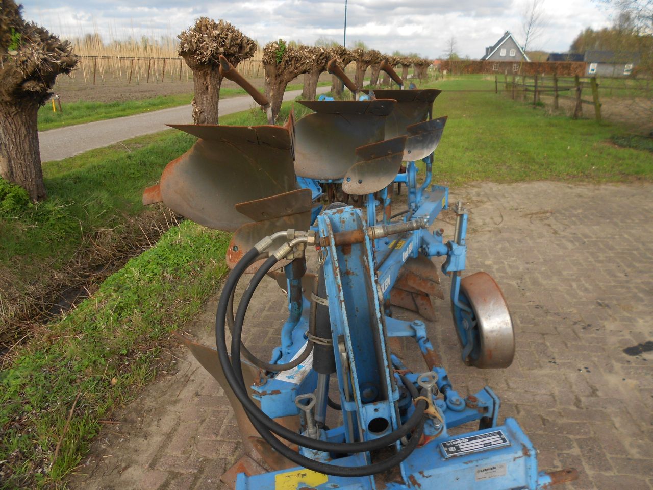 Lemken opal 090 met vorenpakker