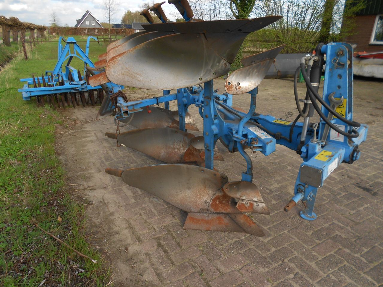 Lemken opal 090 met vorenpakker