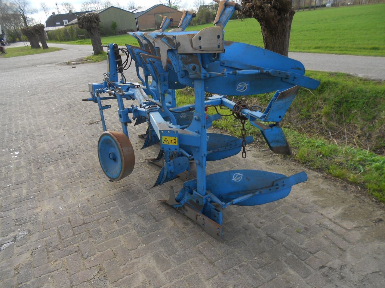 Lemken opal 090 met vorenpakker