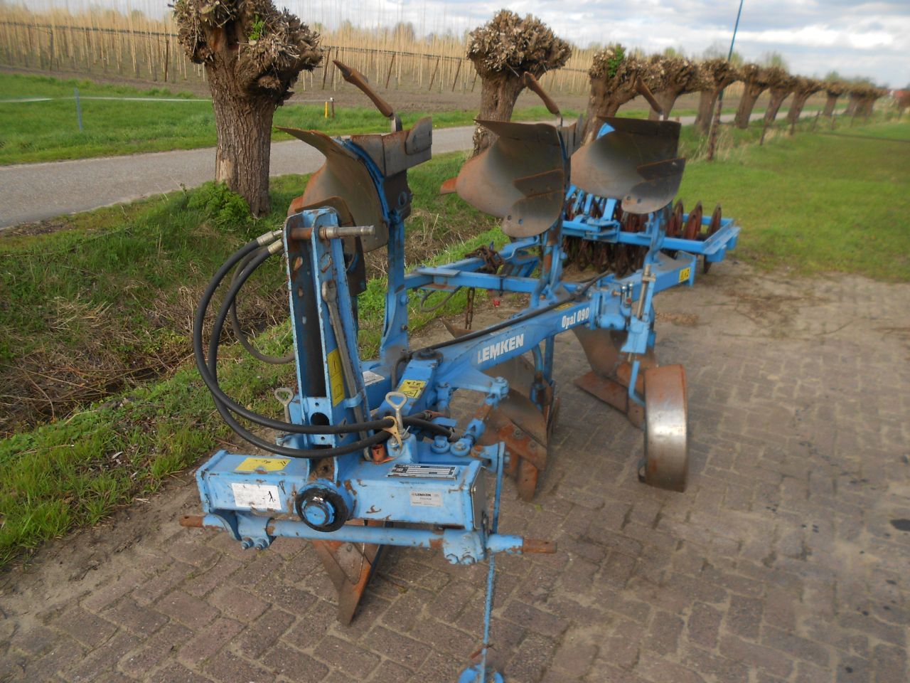 Lemken opal 090 met vorenpakker