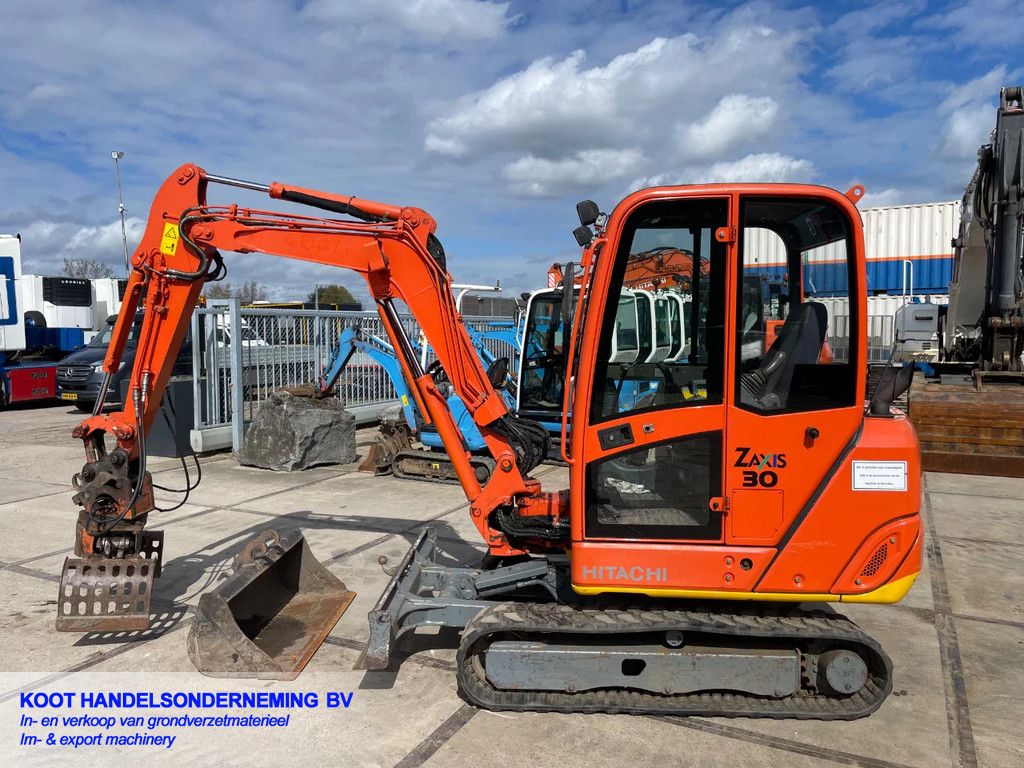 Hitachi Zx 27 (Top) + Sorteergrijper