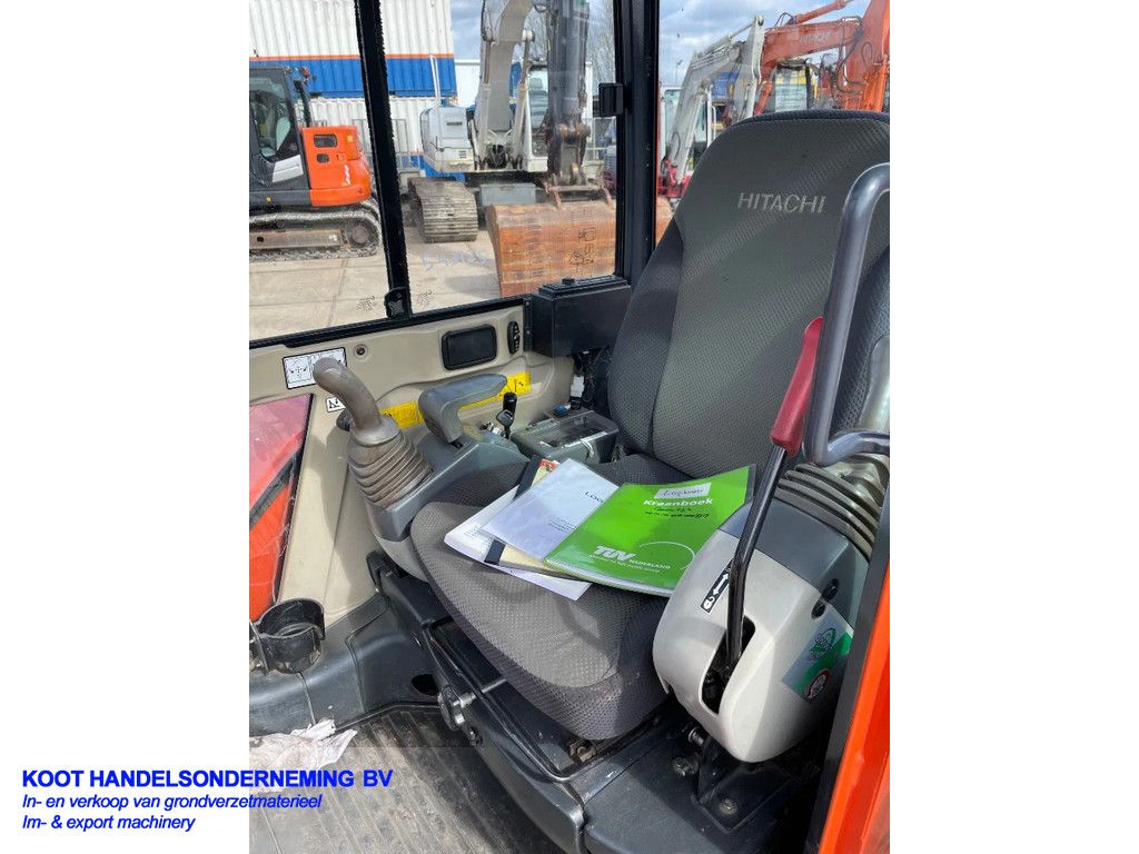 Hitachi Zx 27 (Top) + Sorteergrijper