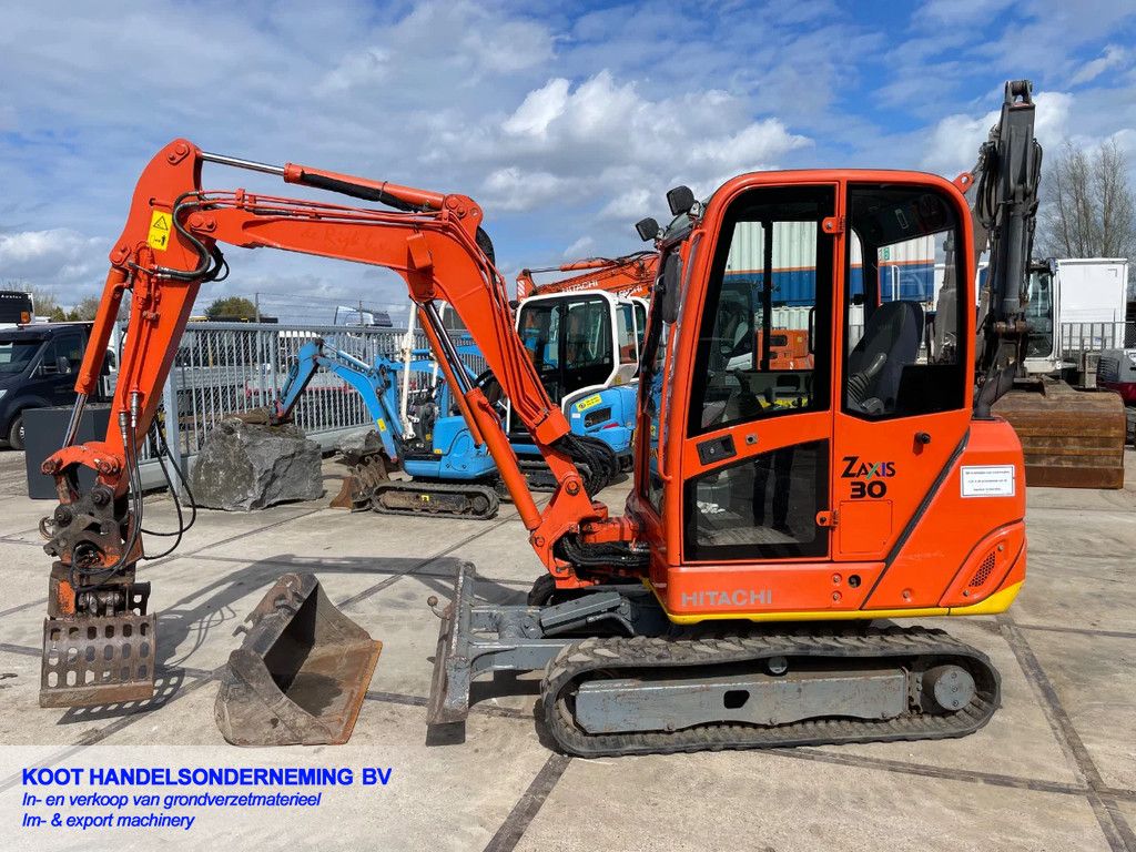 Hitachi Zx 27 (Top) + Sorteergrijper