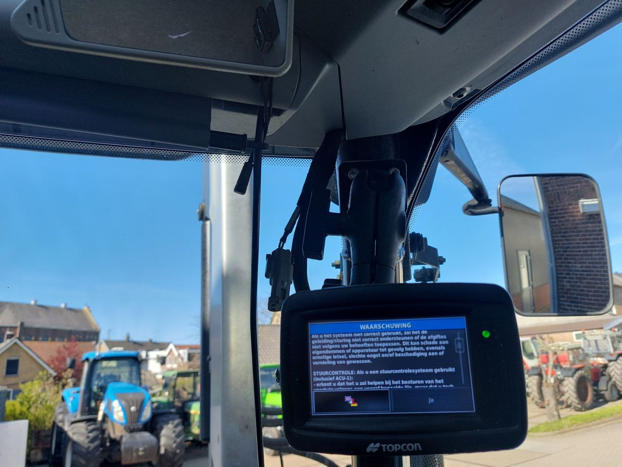 Deutz Agrotron K420 met voorladen en GPS