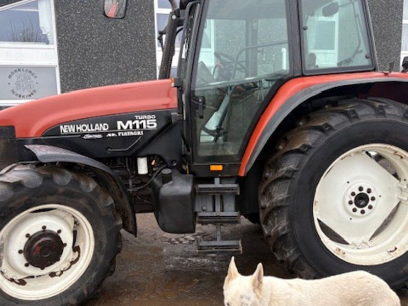 New Holland M115 EN EJERS, FRONTVÆGT, TVILLINGHJUL