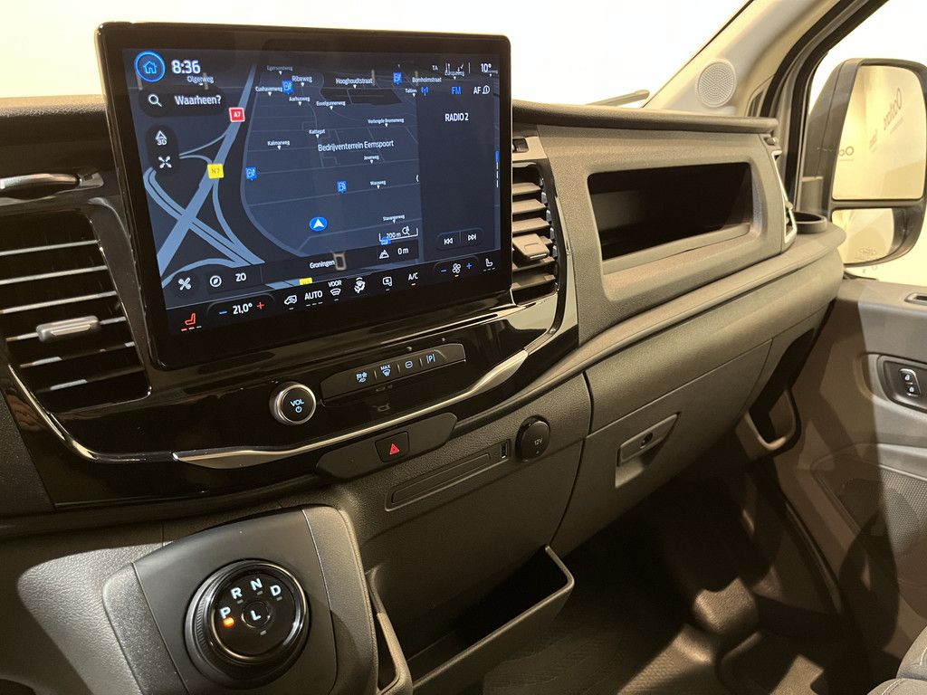 Ford E-Transit 390 (3500 kg) L2H2 Trend 68 kWh 184 PK / 100% Elektrisch !! / Airco / Cruise Control / CarPlay / Camera / Navigatie / 3-Zits / 3.750 KM !!