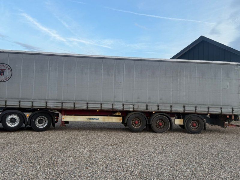 Krone 24 ton gardintrailer med læssebagsmæk 24T med læsserampe